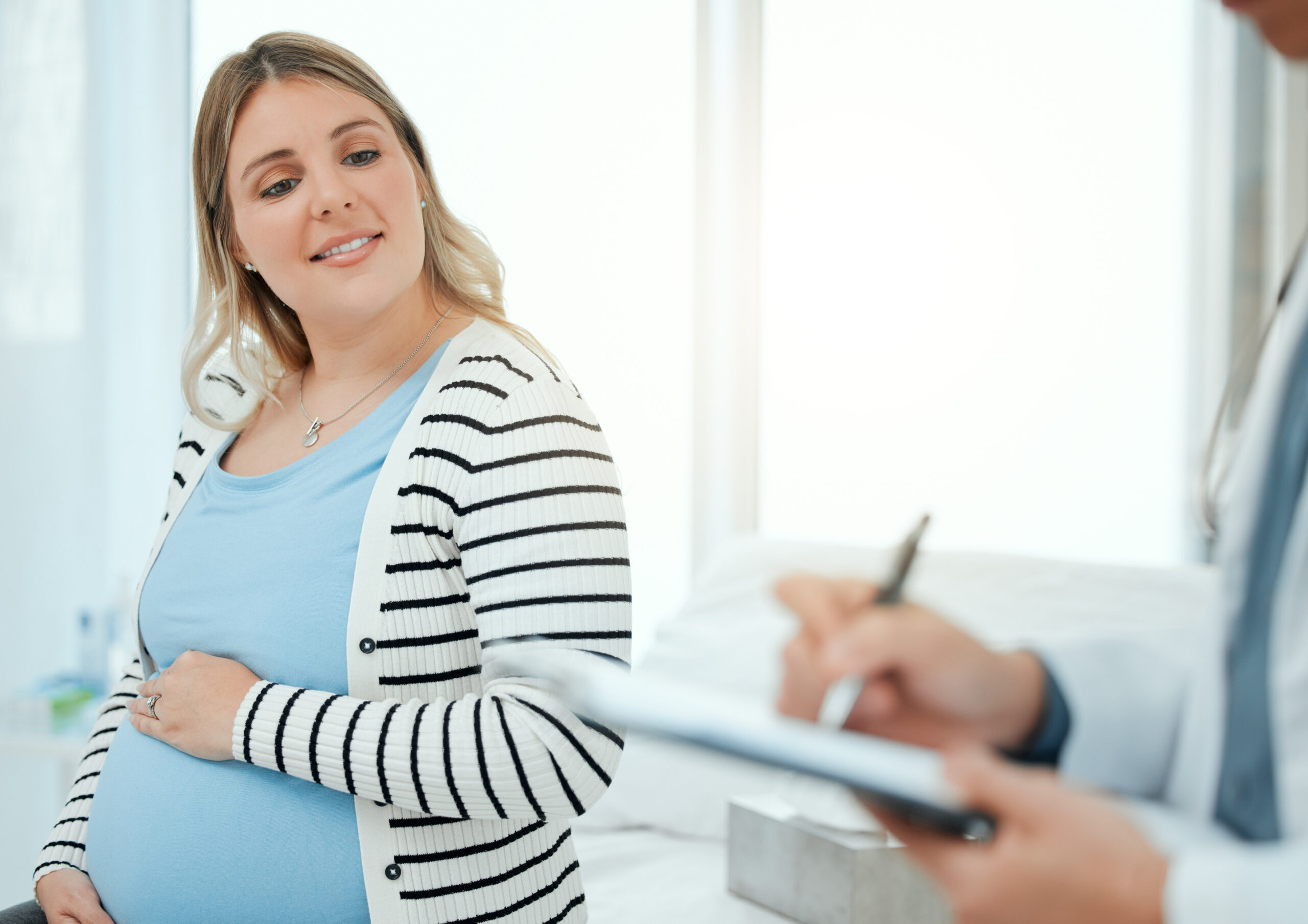 hospital-pregnant-woman-doctor-with-clipboard-checkup-appointment-visit-tummy-growth-healthcare-patient-obstetrician-with-checklist-pregnancy-monitor-health-belly-wellness